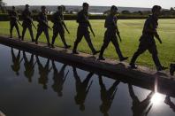 <p>Soldiers march in the garden of the official presidential residence Alvorada Palace, in Brasilia, Brazil, Wednesday, Aug. 31, 2016. (AP Photo/Leo Correa) </p>