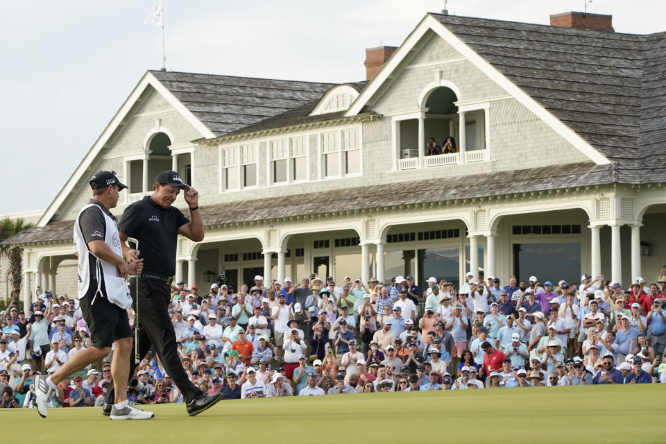 Phil Mickelson leaves the 18th green during the third round at the PGA Championship golf tournament on the Ocean Course, Saturday, May 22, 2021, in Kiawah Island, S.C. (AP Photo/Matt York)