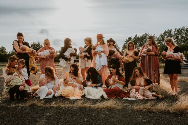 A group of women breastfeeding their babies.