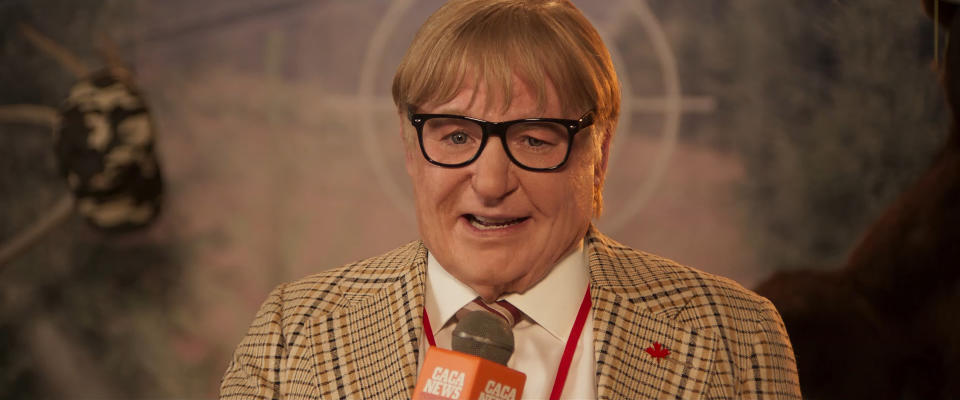 Mike Myers, pictured as Canadian journalist Ken Scarborough in The Pentaverate, takes on the role of eight characters in the comedy series (Netflix)