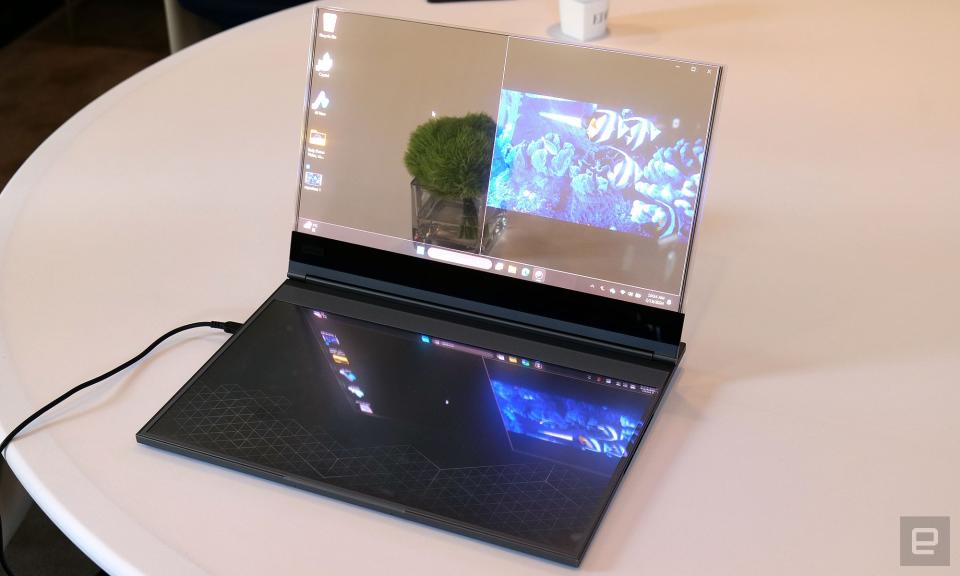 <p>In-person photos of Lenovo's new concept device -- Project Crystal -- which the company claims is the world's first laptop with a transparent micro LED display.</p> 