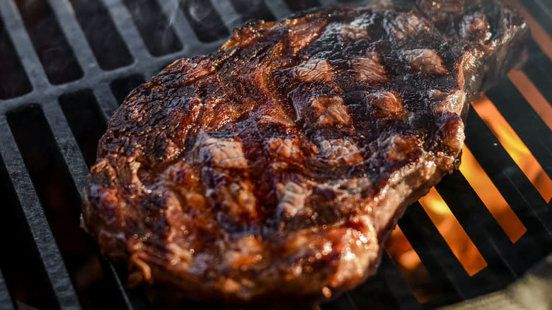 A steak with grill marks on a BBQ