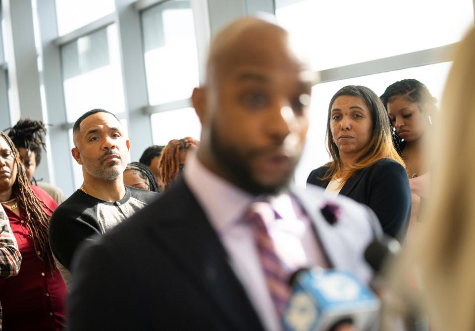 Attorney Sean Walton gives a statemet to the media while Casey Goodson Jr.'s mother Tamala Payne (right) and Pastor Michael Young of the City of Grace Church (left) listen behind him in the trial of Michael Jason Meade at the Franklin County Common Pleas Court.