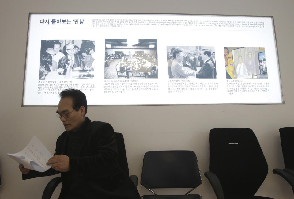 South Korean Choi Gi-hong, 70, watches an application form to reunite with his family members who live in North Korea, at the headquarters of the Korea Red Cross in Seoul, South Korea, Thursday, March 6, 2014. Seoul said that North Korea rejected Seoul's proposal to hold talks on reunions of families divided by the 1950-53 Korean War. South Korea wants to make such reunions, which were held last month for the first time in more than three years, become regular events, but analysts say Pyongyang worries that could take away a key piece of political leverage with the South. (AP Photo/Ahn Young-joon).