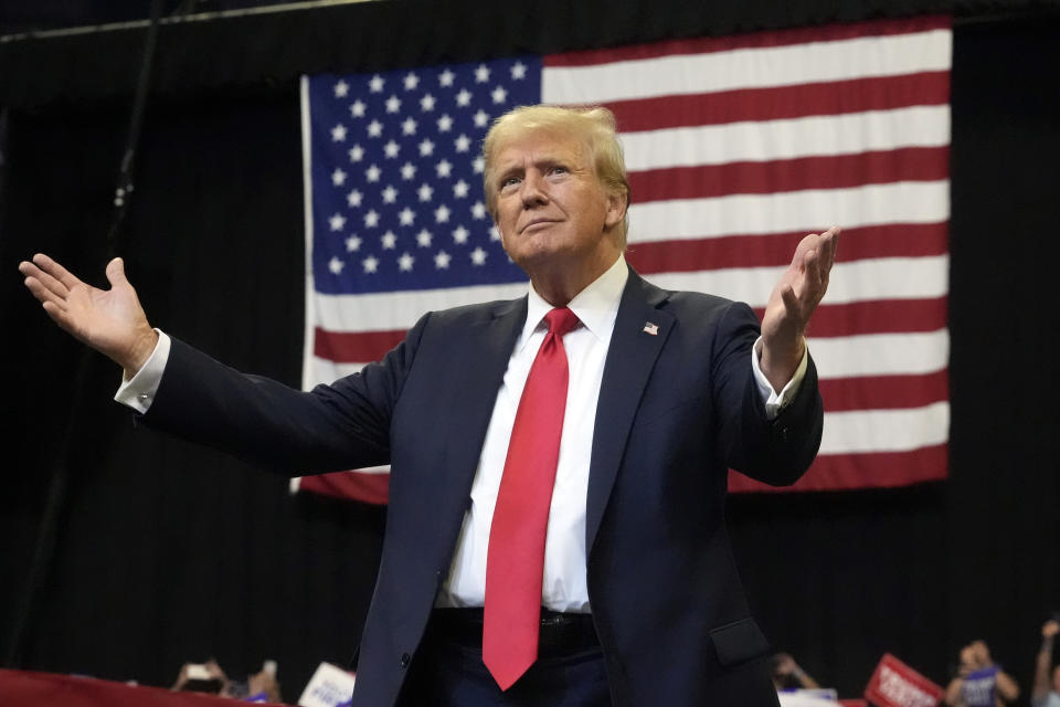 Former President Donald Trump, a Republican presidential candidate, arrives for a campaign rally in Bozeman, Montana, Friday, Aug. 9, 2024. (AP Photo/Rick Baumer)