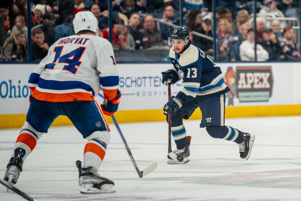 Oct 28, 2023; Columbus, Ohio, United States;
Columbus Blue Jackets left wing Johnny Gaudreau (13) looks for an open pass during the third period of their game against the New York Islanders on Saturday, Oct. 28, 2023 at Nationwide Arena.