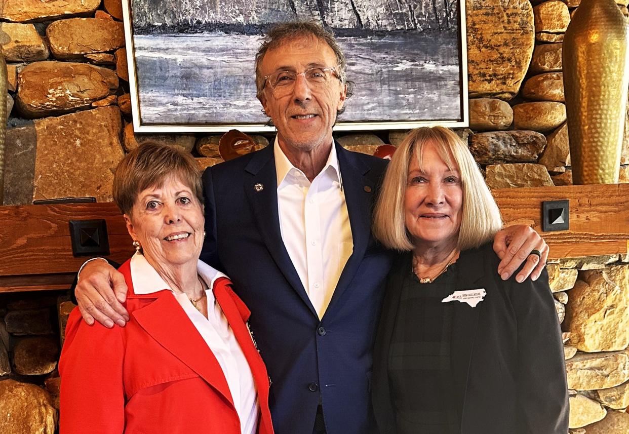 Blue Ridge Honor Flight founder Jeff Miller, center, was recently honored by the Daughters of the American Revolution with the Community Service Award. At left is DAR Regent Charlotte Walsh and at right is Community Service Award Chair Dorsa McGuire.
