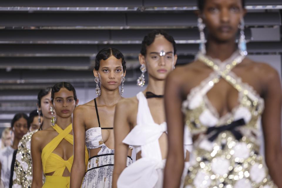 Models wear creations for the Giambattista Valli ready-to-wear Spring/Summer 2023 fashion collection presented Friday, Sept. 30, 2022 in Paris. (Photo by Vianney Le Caer/Invision/AP)