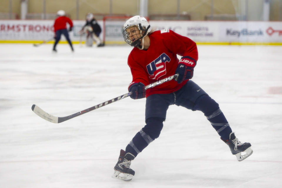In this photo taken Monday, Nov. 4, 2019, Amanda Kessel, a member of the U.S. Women's National hockey team, goes through drills during their practice in Cranberry Township, Butler County, Pa. Many of the top women’s hockey players on the planet say they’re resolute in their decision to not play professionally in North America until a new league that provides better pay and better benefits materializes. (AP Photo/Keith Srakocic)
