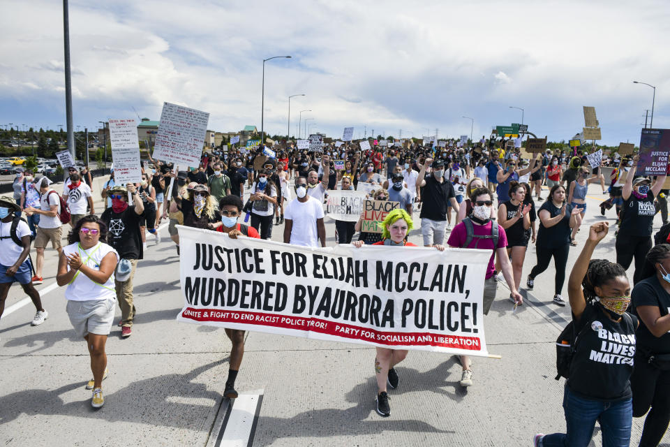 Protesters shut down a highway while demanding justice for Elijah McClain on June 27  in Aurora, Colo.  (Photo by Michael Ciaglo/Getty Images)