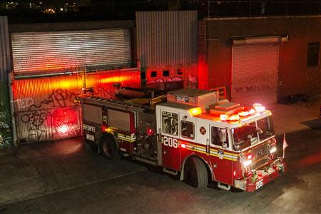 A New York Fire Department truck departs the scene of a multiple shooting crime scene on Maujer Street in the Brooklyn borough of New York, November 11, 2013. REUTERS/Lucas Jackson