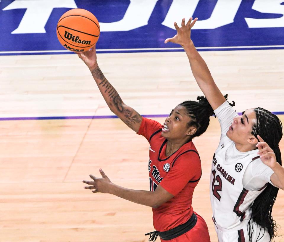 University of Mississippi guard Angel Baker (15) shoots near South Carolina guard Brea Beal (12) during the first quarter of the SEC Women's Basketball Tournament at Bon Secours Wellness Arena in Greenville, S.C. Saturday, March 4, 2023. 