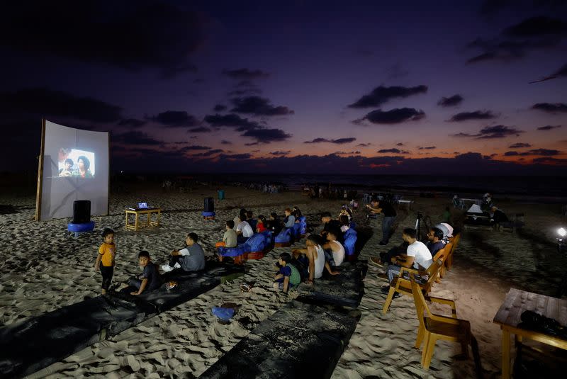 FILE PHOTO: "Cinema and popcorn" a Gaza boy's wish at a rare cinema event