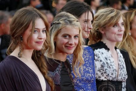 (L-R) Actresses Lou de Laage, Melanie Laurent, Josephine Japy, and Isabelle Carre pose on the red carpet as they arrive for the screening of the film "The Homesman" in competition at the 67th Cannes Film Festival in Cannes May 18, 2014. REUTERS/Yves Herman