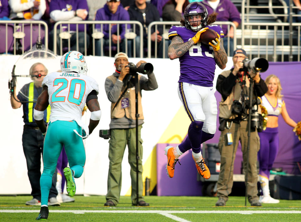 <p>Tyler Conklin #83 of the Minnesota Vikings catches the ball in the first quarter of the game against the Miami Dolphins at U.S. Bank Stadium on December 16, 2018 in Minneapolis, Minnesota. (Photo by Adam Bettcher/Getty Images) </p>