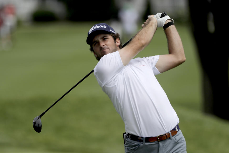 In this Thursday, June 25, photo, Denny McCarthy tees off on the third hole during the first round of the Travelers Championship golf tournament at TPC River Highlands in Cromwell, Conn. McCarthy told Golfchannel.com that he withdrew from the tournament after feeling sick Thursday night and testing positive for the coronavirus on Friday. Bud Cauley, who played with McCarthy on Thursday, also withdrew before Friday's second round. McCarthy became the third PGA Tour player to test positive for the virus since its restart and the second this week, joining Cameron Champ who withdrew on Tuesday. Nick Watney withdrew just before the second round of last week's RBC Heritage Championship. (AP Photo/Frank Franklin II)