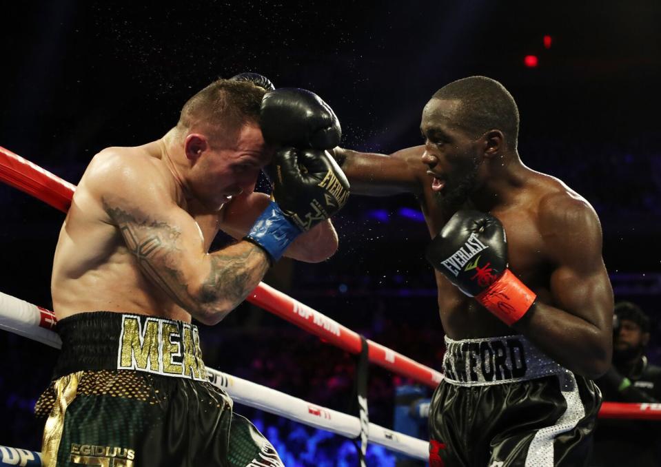 Terence Crawford punches Egidijus Kavaliauskas at Madison Square Garden on Dec. 14, 2019, in New York City.