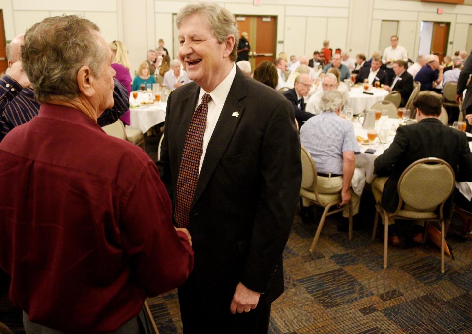 U.S. Senator John Kennedy, right, talks to Thomas Tebbe at the luncheon for the Rotary Club of Shreveport in the Shreveport Convention Center, Tuesday 28, 2019.