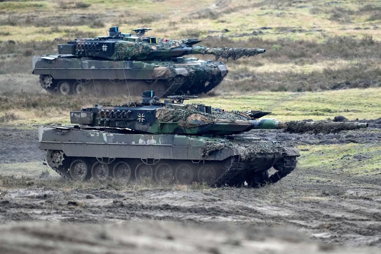 Two Leopard 2 tanks are seen in action at the Field Marshal Rommel Barracks in Augustdorf, Germany, (Copyright 2023 The Associated Press. All rights reserved.)