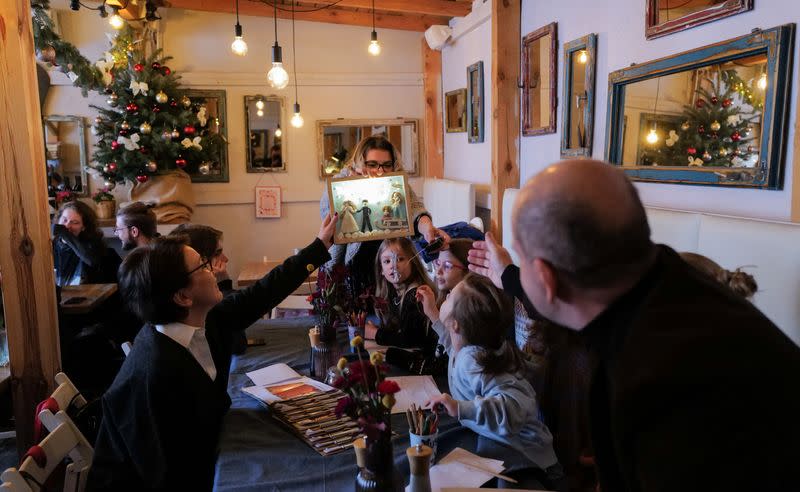 Ukrainian refugees celebrate Christmas across central Europe as war lingers