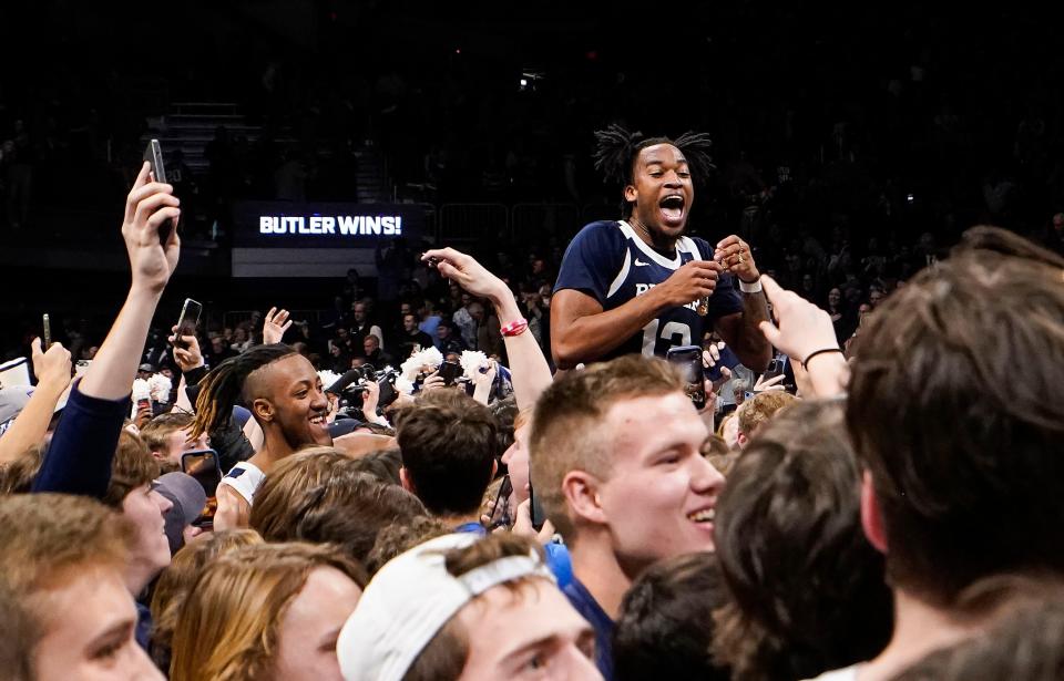 Butler Bulldogs quarterback Jayden Taylor (13) is raised by the students after the Butler Bulldogs defeated the Xavier Musketeers on Friday, Feb. 10, 2023 at Hinkle Fieldhouse in Indianapolis.  The Butler Bulldogs defeated Xavier Musketeer 69-67.