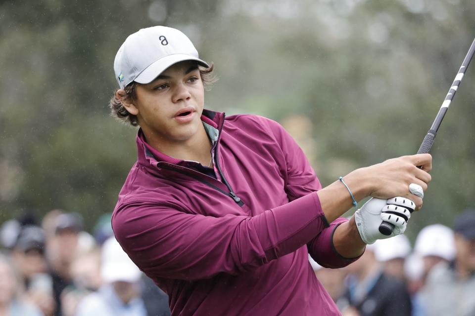 Charlie Woods hits his shot off the first tee during last year's PNC Championship at The Ritz-Carlton Golf Club in Orlando.