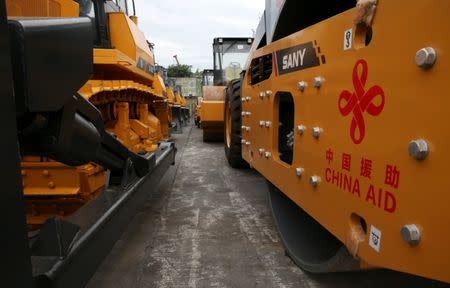 Construction equipments donated by China, that will aid in the rehabilitation of the war-torn Marawi city, are seen in the port of Iligan city, southern Philippines October 19, 2017. REUTERS/Romeo Ranoco