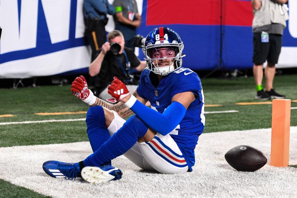 Aug 18, 2023; East Rutherford, New Jersey, USA; New York Giants wide receiver Jalin Hyatt (84) reacts after catching a touchdown pass against the Carolina Panthers during the second quarter at MetLife Stadium. Mandatory Credit: John Jones-USA TODAY Sports