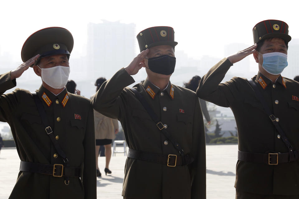 North Korean army officers visit the Mansu Hill on the occasion of the Day of the Sun, the birth anniversary of late leader Kim Il Sung, in Pyongyang, North Korea Thursday, April 15, 2021. (AP Photo/Cha Song Ho)