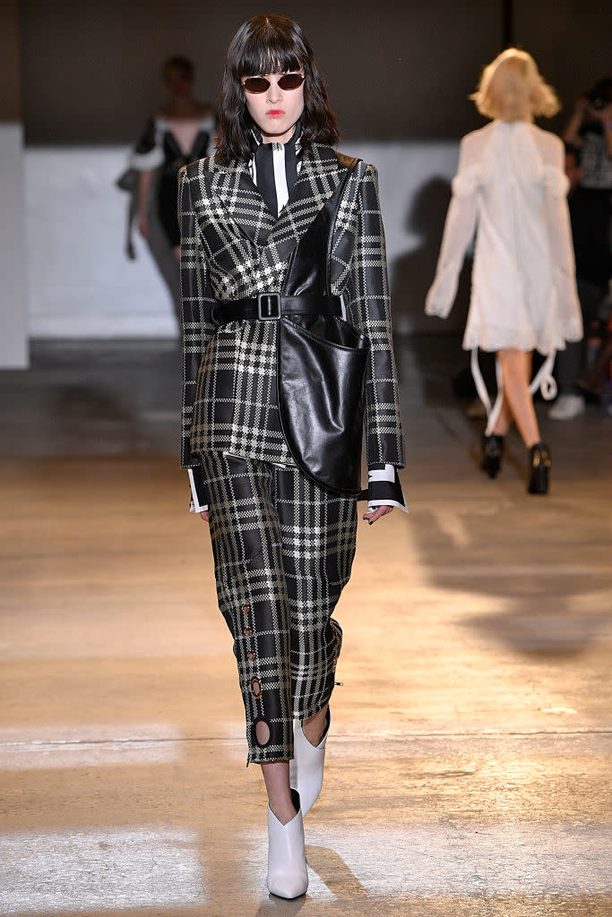 <p>Model wears a plaid pantsuit at the fall 2018 Self-Portrait show. (Photo: Getty Images) </p>