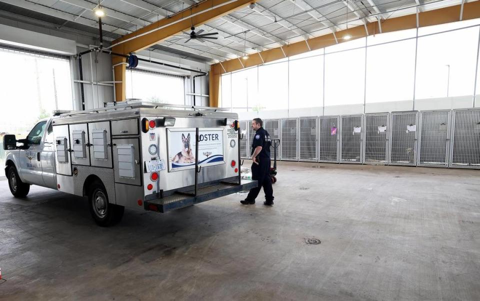 A Fort Worth Animal Control officer drops off stray animals at Fort Worth North Animal Care and Adoption Campuson Wednesday, October 25, 2023, in Fort Worth.