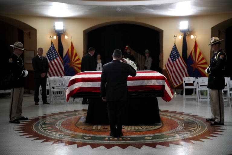 Friends say John McCain 'believed in America,’ as late senator lays in state in Arizona