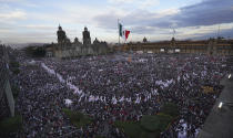 Mexican President Andres Manuel Lopez Obrador speaks to the crowd at a rally to commemorate his third anniversary in office, in the main square of the capital, the Zocalo, in Mexico City, Wednesday, Dec. 1, 2021. (Photo AP/Marco Ugarte)