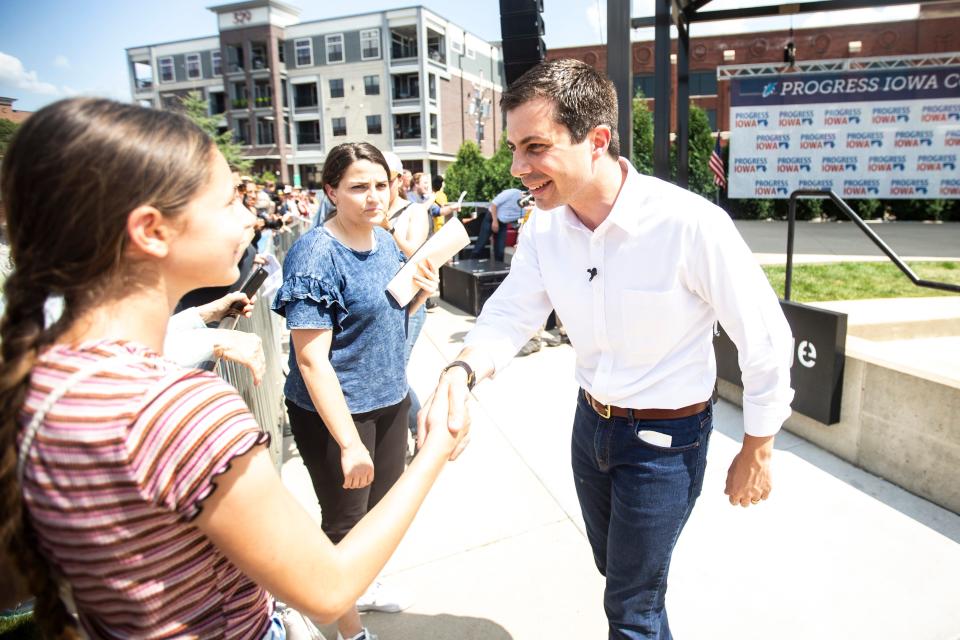 Pete Buttigieg, Mayor of South Bend, Indiana, shakes hands with a supporter during Progress Iowa Corn Feed, Sunday, July 14, 2019, the Newbo City Market in Cedar Rapids, Iowa.