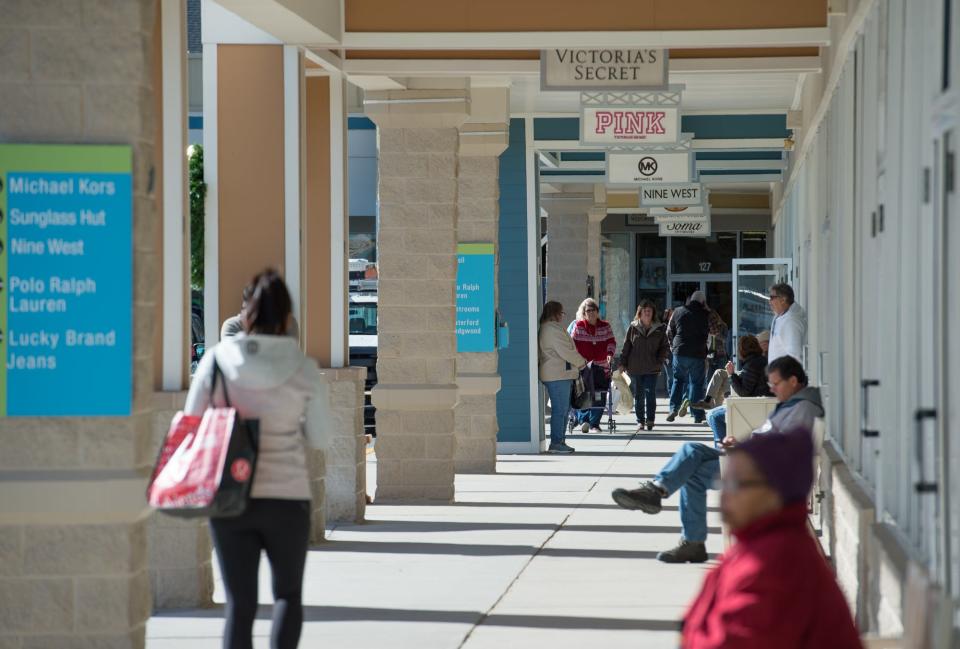 Shoppers at Tanger Outlets Surfside location in Rehoboth.