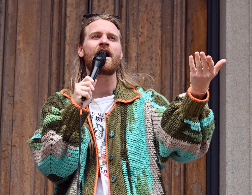 Sam Ryder, the UK Eurovison entrant in 2022, plays to a crowd at the Albert Dock in Liverpool, north west England on May 11, 2023 ahead of the second semi final. (Photo by Paul ELLIS / AFP) (Photo by PAUL ELLIS/AFP via Getty Images)