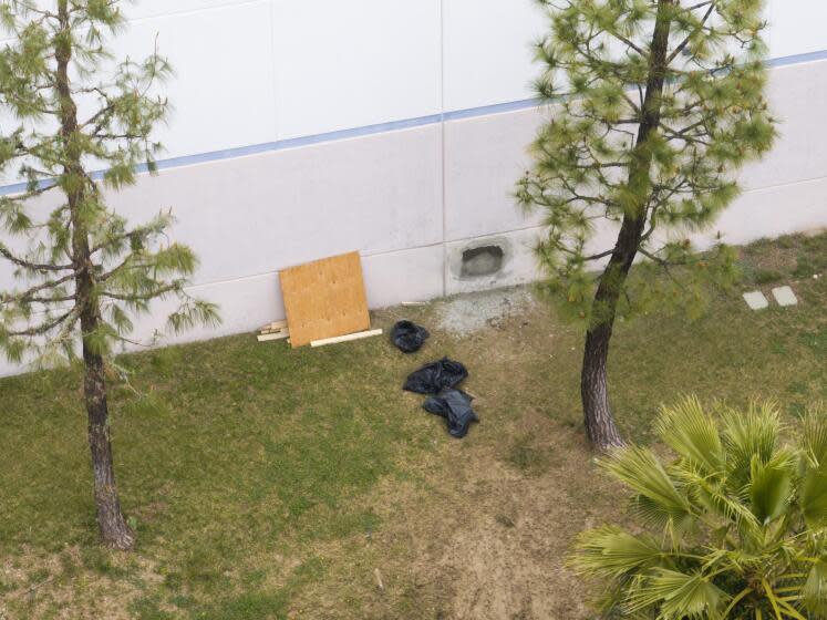 LOS ANGELES, CA- APRIL 04: Damage to a wall seems to be under repair at Gardaworld in Sylmar on Thursday, April 4, 2024. (NEWS REPORTS SAID THEY ENTERED THROUGH THE ROOF) Thieves made off with as much as $30 million in an Easter Sunday burglary from the facility. (Myung J. Chun / Los Angeles Times)