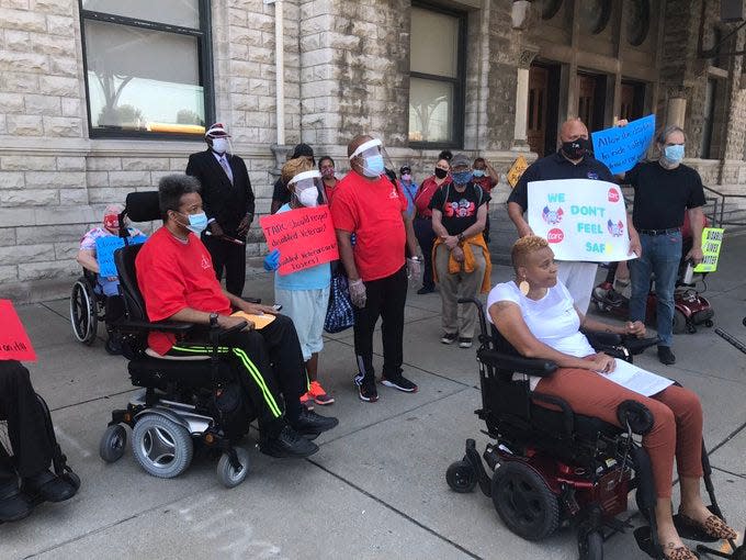 A group of people gathered at TARC headquarters to protest what they called a failure from the company to enforce COVID rules on buses on Tuesday, Sept. 8, 2020.