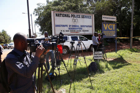 Journalists wait outside the Director of Criminal Investigation headquarters, following the arrest of the head of the National Youth Service Richard Ndubai along with an unspecified number of officials over corruption in Nairobi, Kenya May 28, 2018. REUTERS/Baz Ratner