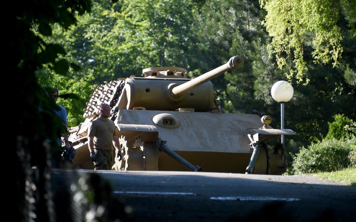 A 'Panther' battle tank is ready for transport on a residential property in Heikendorf, Germany, 02 July 2015. Since 01 July, police and armed forces are removing recently discovered military equipment from World War II including the 'Panther' tank, weapons and a torpedo. The armoured recovery vehicle is used for safe transportation of weapons. Photo: CARSTEN REHDER/ - Carsten Rehder/B284