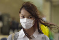 Hong Kong activist Agnes Chow arrives at a court in Hong Kong, Monday, Nov. 22. 2020. Hong Kong pro-democracy activists Joshua Wong, Agnes Chow and Ivan Lam appear at court for their trial, as the trio faces charges related to the besieging of a police station during anti-government protests last year. (AP Photo/Vincent Yu)