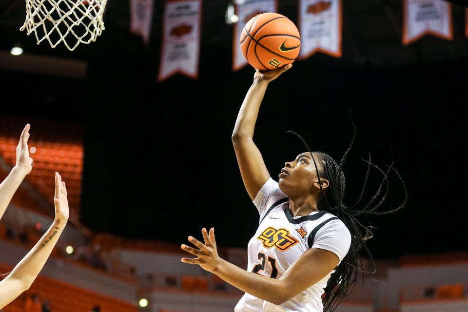 Oklahoma State guard Terryn Milton (21) jumps to shoot in the first half during a women’s college basketball game between the Oklahoma State Cowgirls (OSU) and the Texas Tech Lady Raiders at Gallagher-Iba Arena in Stillwater, Okla., on Wednesday, Feb. 1, 2023.