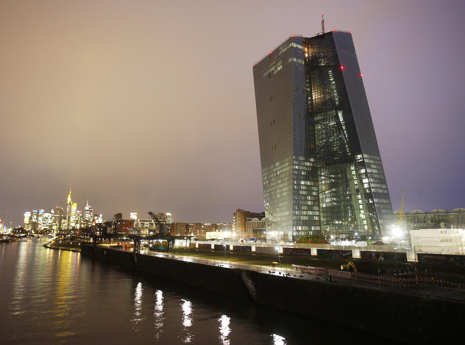 The new headquarters of the European Central Bank (ECB), building at right, is under construction on the water front of the River Main, in Frankfurt, Germany, Friday, Feb. 14, 2014. The ECB is supposed to move into this new building at the end of 2014. The fourth quarter financial growth for 2013 outperformed analysts' expectations and eased some of the pressure on the European Central Bank to loosen its monetary policy. (AP Photo/Michael Probst)