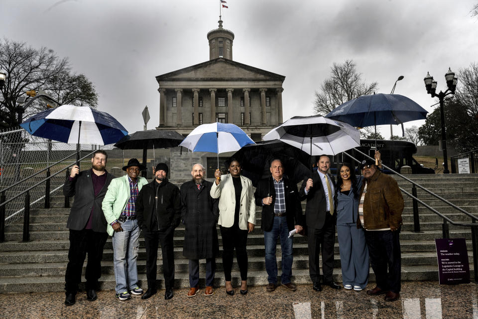 This image provided by Michael Weintrob shows the TN11, a group of citizens brought together by Citizen Solutions to discuss potential gun rights changes, stands outside the state capital in Nashville on Jan. 9, 2024. (Michael Weintrob via AP)