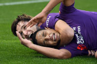 Fiorentina's forward Luis Muriel, right, celebrates with a teammate after scoring during a Serie A soccer match between Fiorentina and Sampdoria at the Artemio Franchi stadium in Florence, Italy, Sunday, Jan. 20, 2019. (Claudio Giovannini/ANSA via AP)