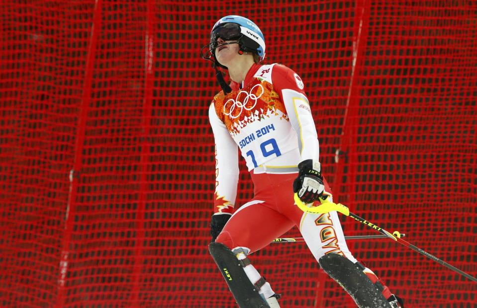 Canada's Erin Mielzynski reacts after skiing out during the first run of the women's alpine skiing slalom event at the 2014 Sochi Winter Olympics at the Rosa Khutor Alpine Center February 21, 2014. REUTERS/Ruben Sprich (RUSSIA - Tags: SPORT SKIING OLYMPICS)