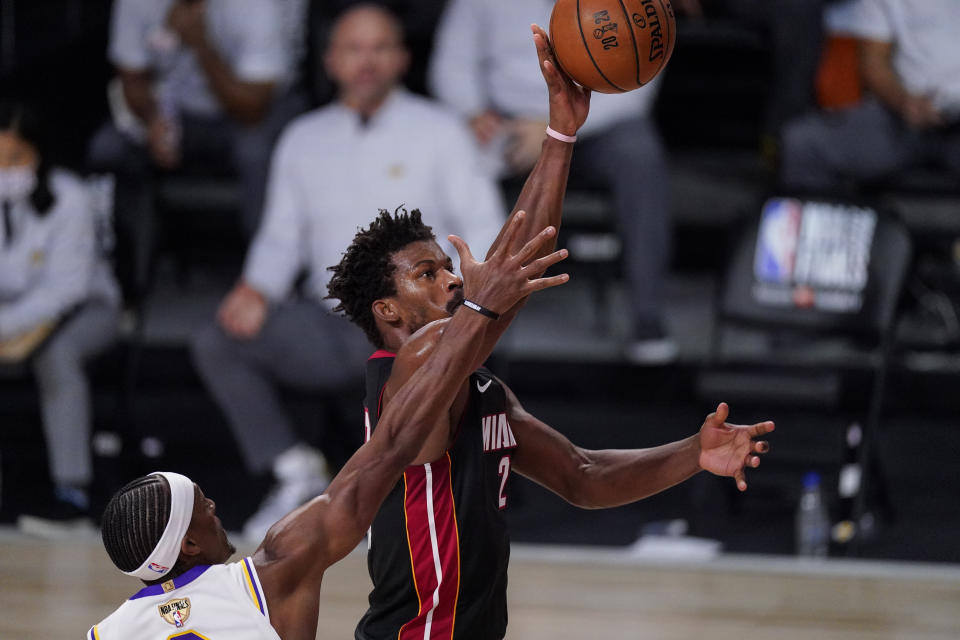 Miami Heat's Jimmy Butler (22) shoots the ball during the second half in Game 3 of basketball's NBA Finals against the Los Angeles Lakers, Sunday, Oct. 4, 2020, in Lake Buena Vista, Fla. (AP Photo/Mark J. Terrill)