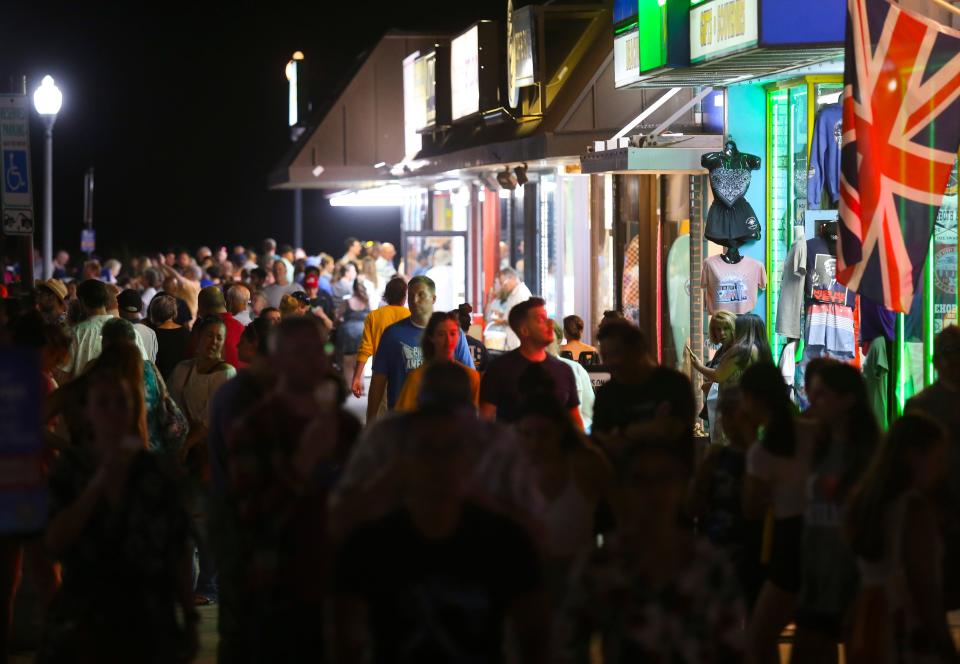 Crowds take in amusements or food and stroll the boardwalk at Rehoboth Beach, Saturday, August 21, 2022. Brilliant beach weather assured the Delaware beaches were bustling on one of a dwindling number of summer weekends remaining.