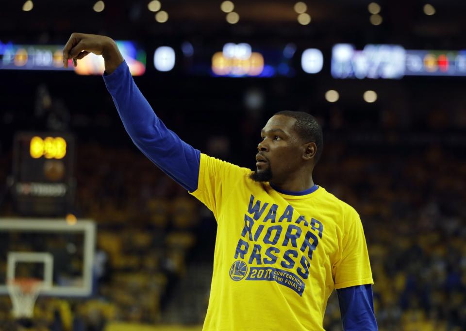 Kevin Durant has a player option for next season that’s worth $27.7 million. (AP)
