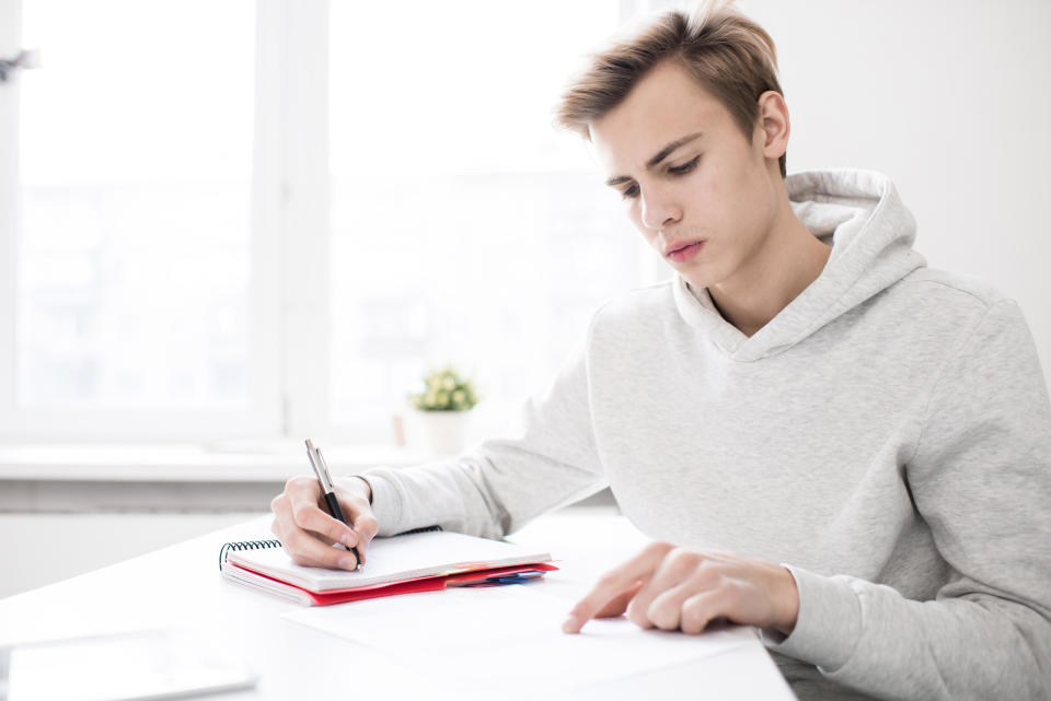 A student writing an essay